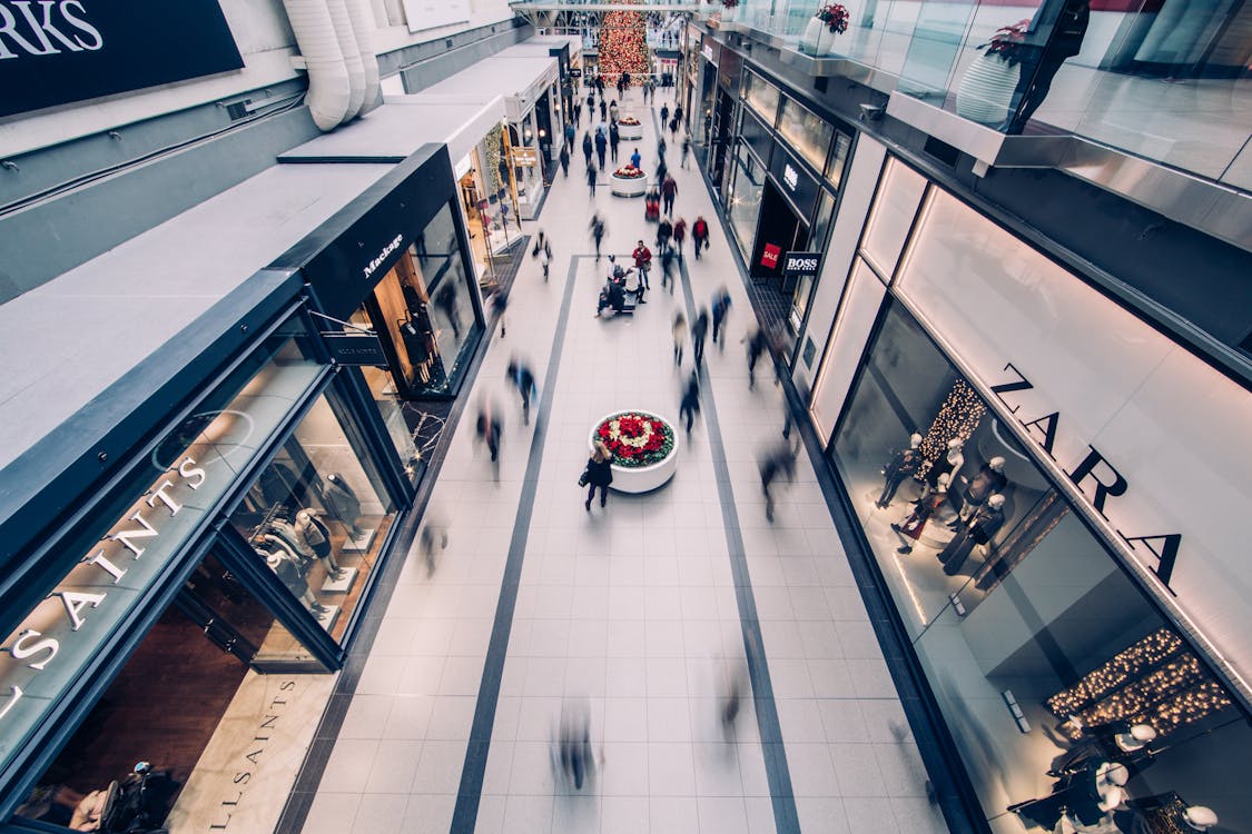 Group of People Walking Inside the Mall