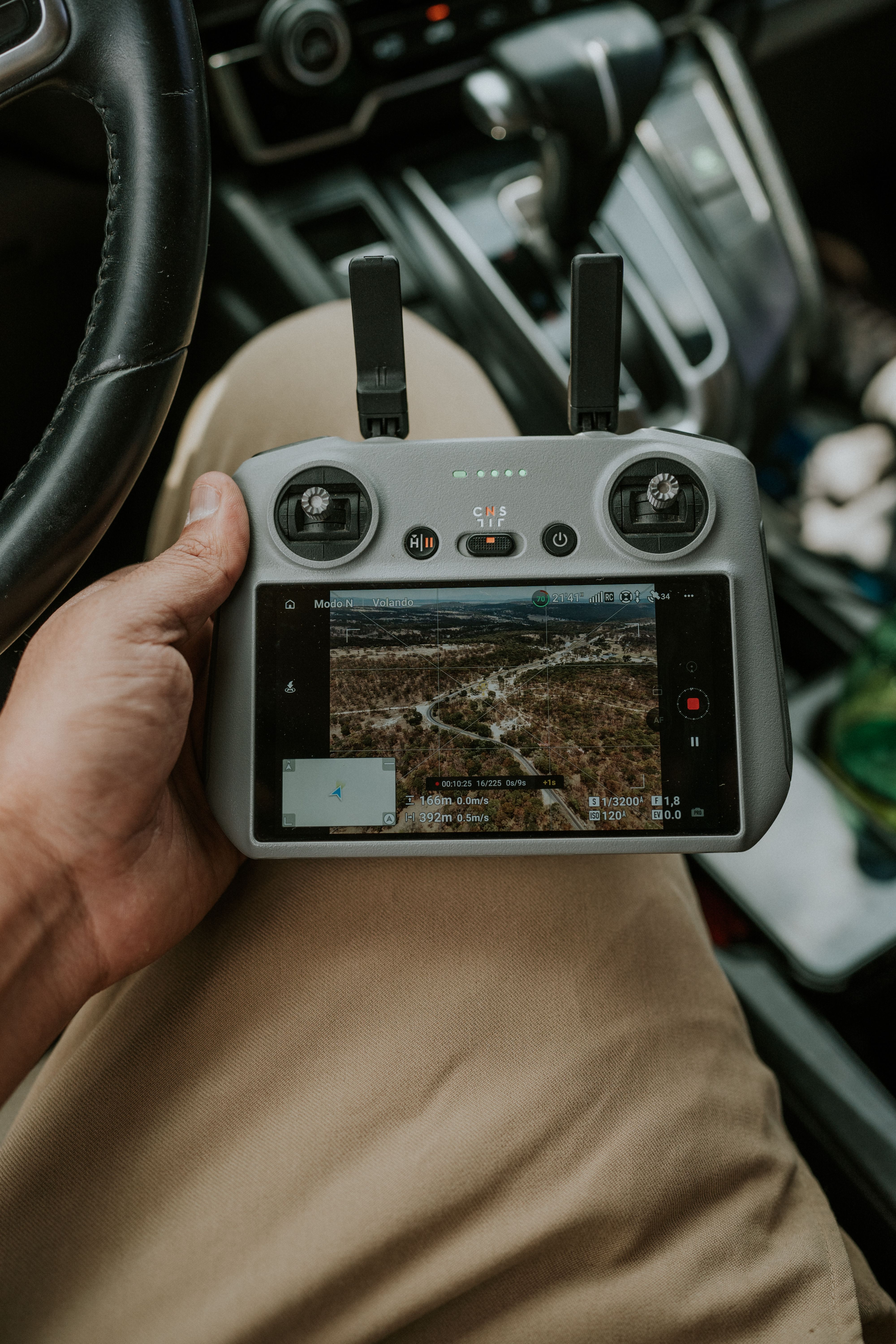 Drone controller showing an aerial view during a visual line of sight flight in Mexico