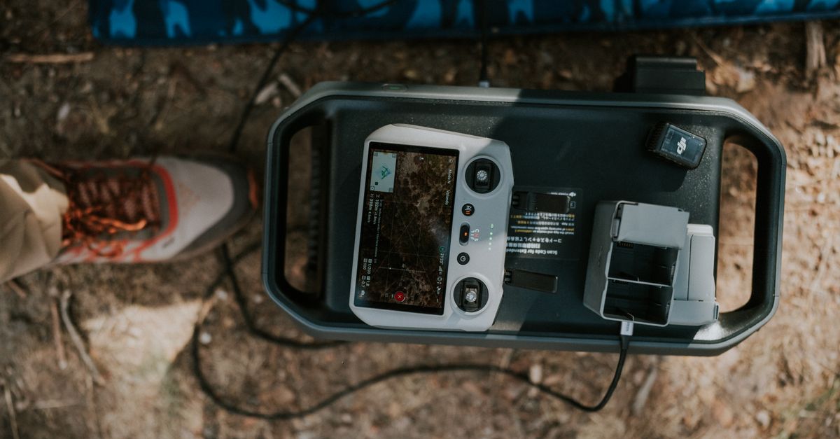 Aerial drone controller setup outdoors on a dusty ground in Guanajuato, Mexico.