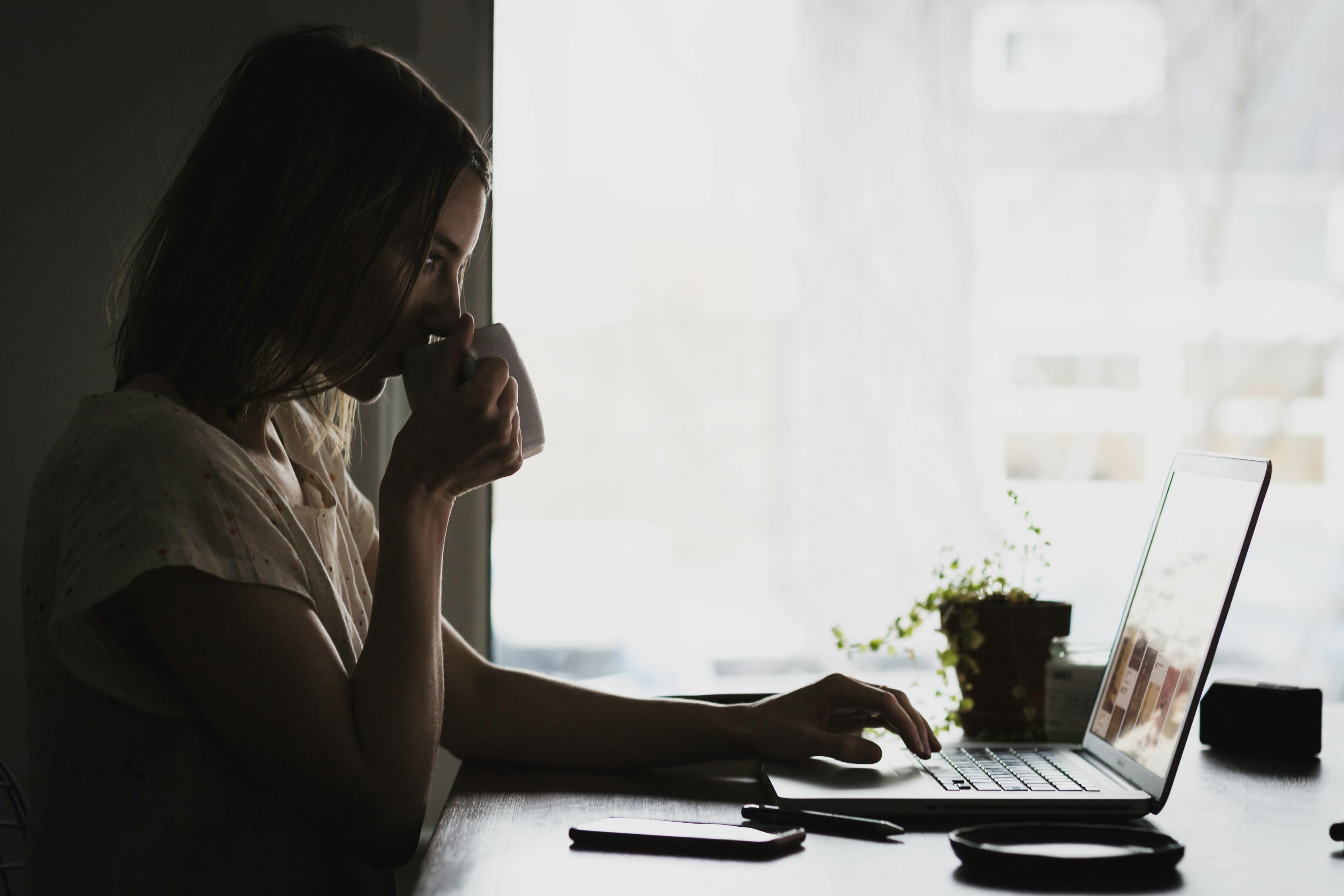 Woman Using Laptop