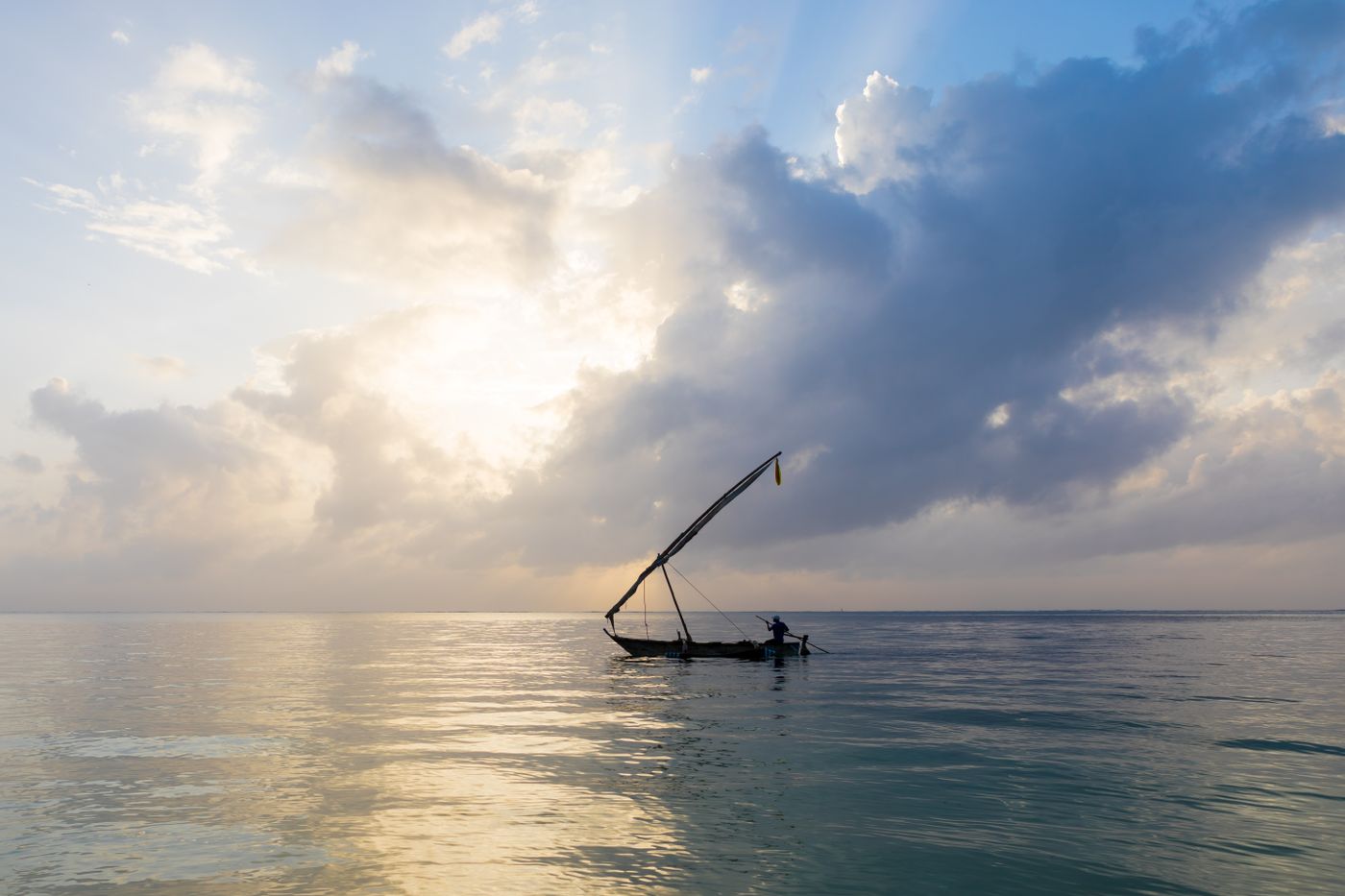 A dhow sailing off Mombasa at sunrise