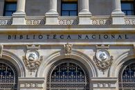 Detailed view of the Biblioteca Nacional facade in Madrid showcasing neoclassical architecture.