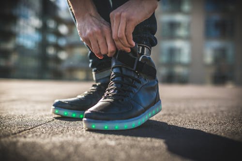 Free Person Wearing Black Shoes Stock Photo