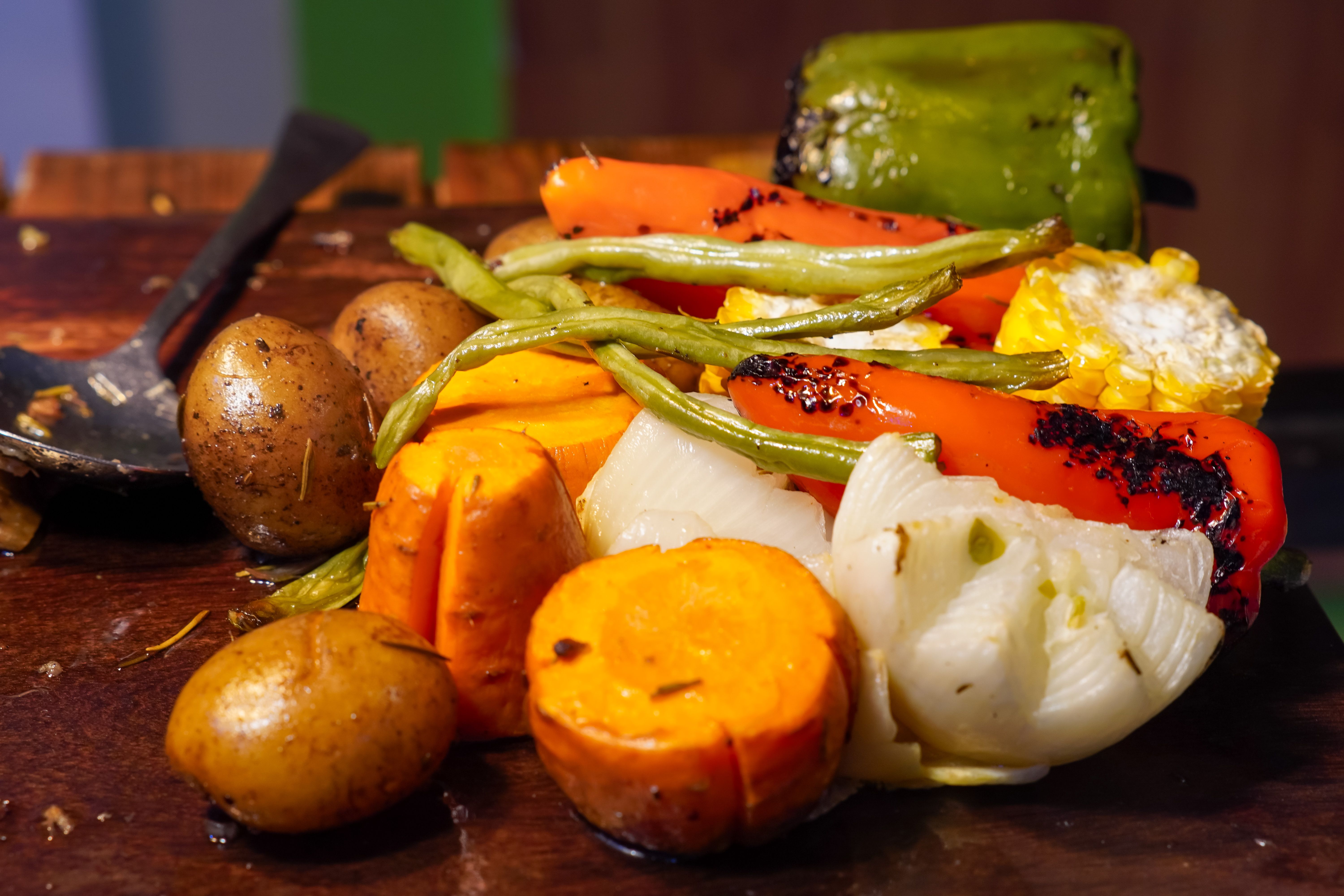 Golden roasted potatoes with caramelized peppers fresh from the oven