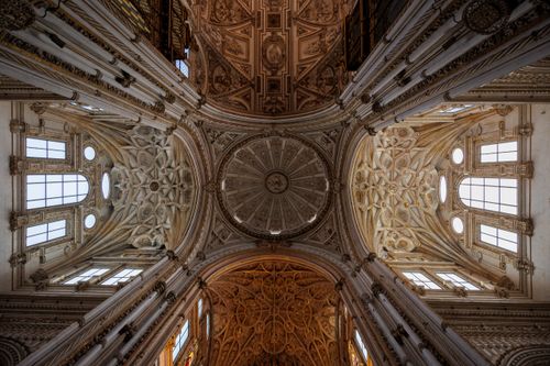 Free Intricate architectural details of the Mezquita-Cathedral ceiling in Córdoba, Spain. Stock Photo