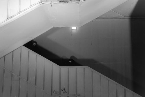 Free Moody black and white photo of a person on a staircase in İstanbul. Stock Photo