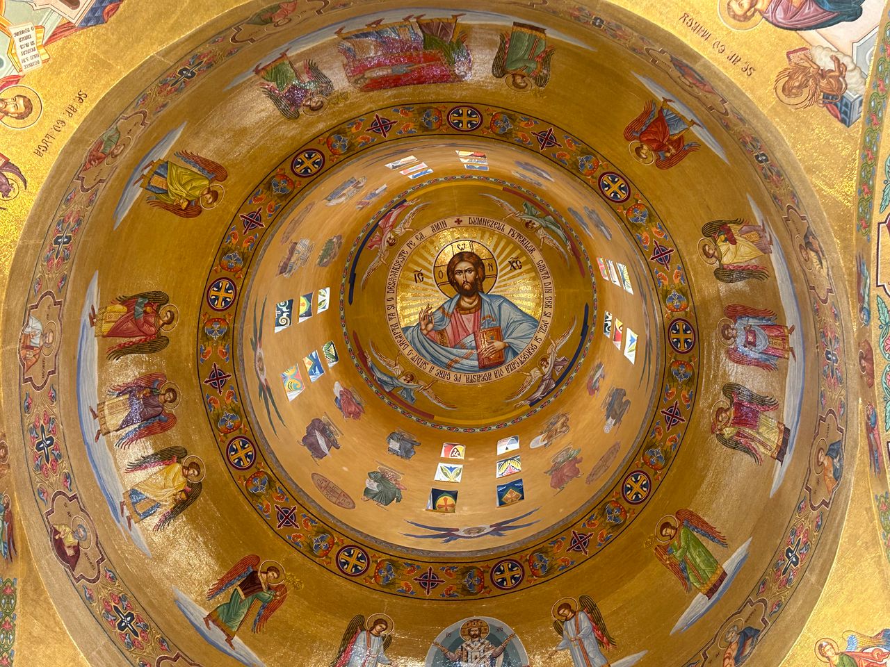 intricately painted dome with religious icons and geometric patterns i