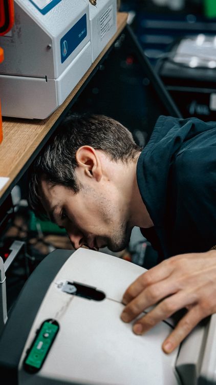 Professional Reparing Lab Technician Repairing Laboratory Equipment Close-Up Β· Free Stock Photo