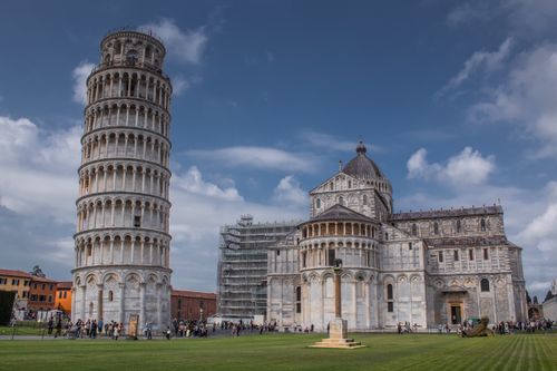 Free Stunning view of the Leaning Tower of Pisa and Cathedral in sunny Tuscany, Italy. Stock Photo