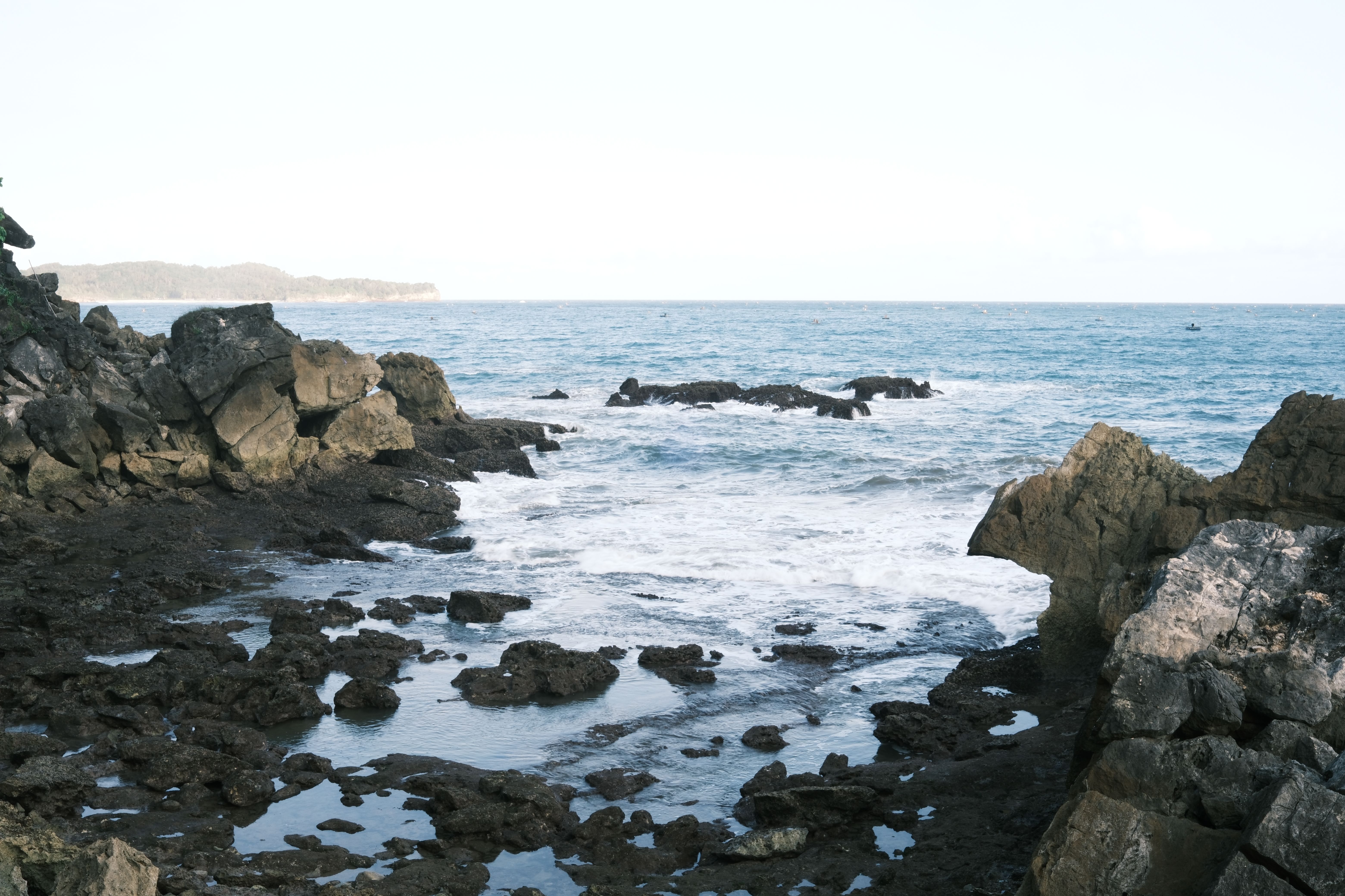 Scenic Coastal Rock Formation and Waves · Free Stock Photo