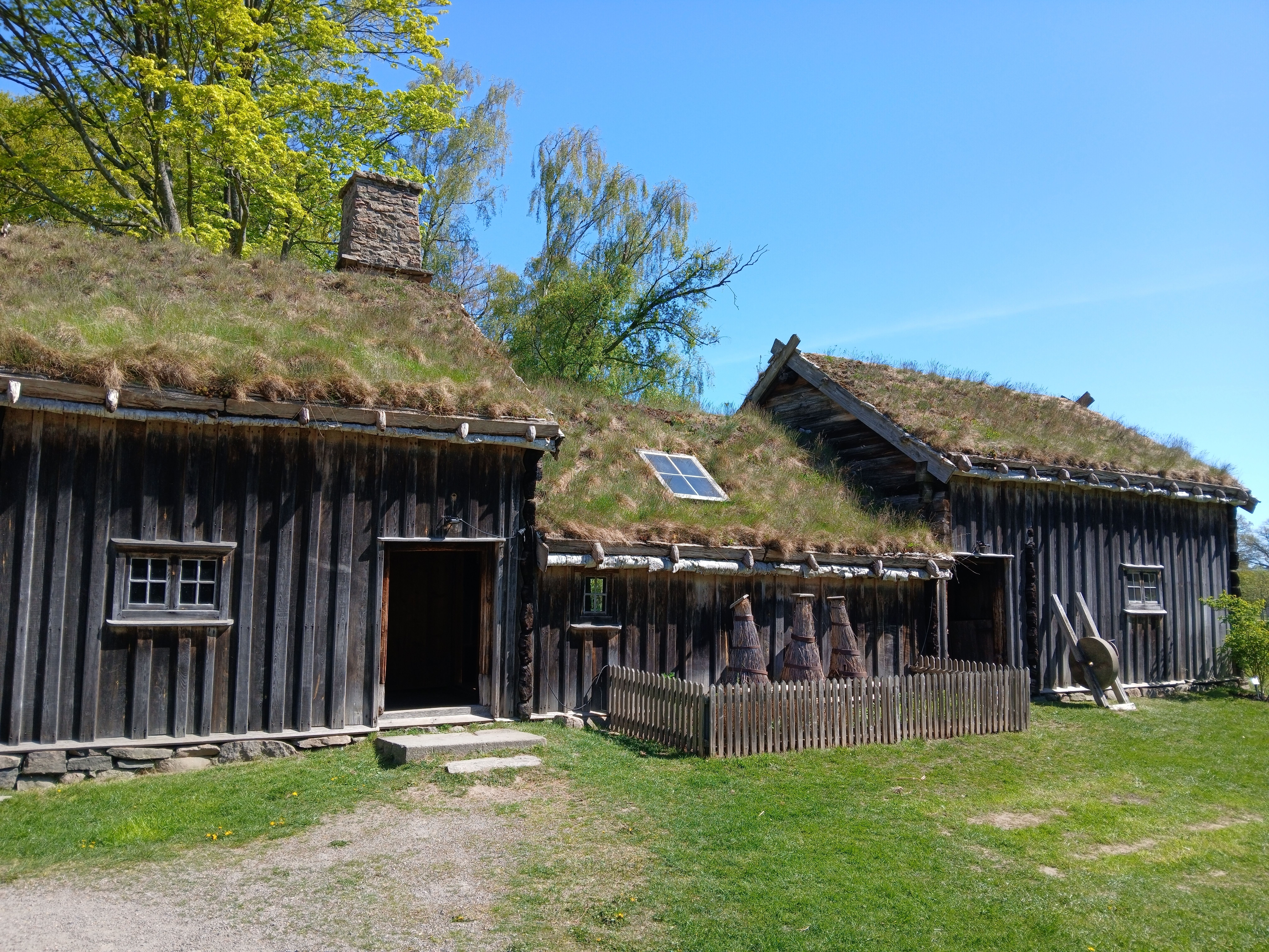 A cozy sod house built on the wide Nebraska prairie