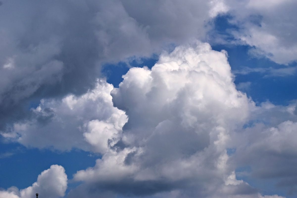 Dramatic Cumulus Clouds in Clear Blue Sky · Free Stock Photo