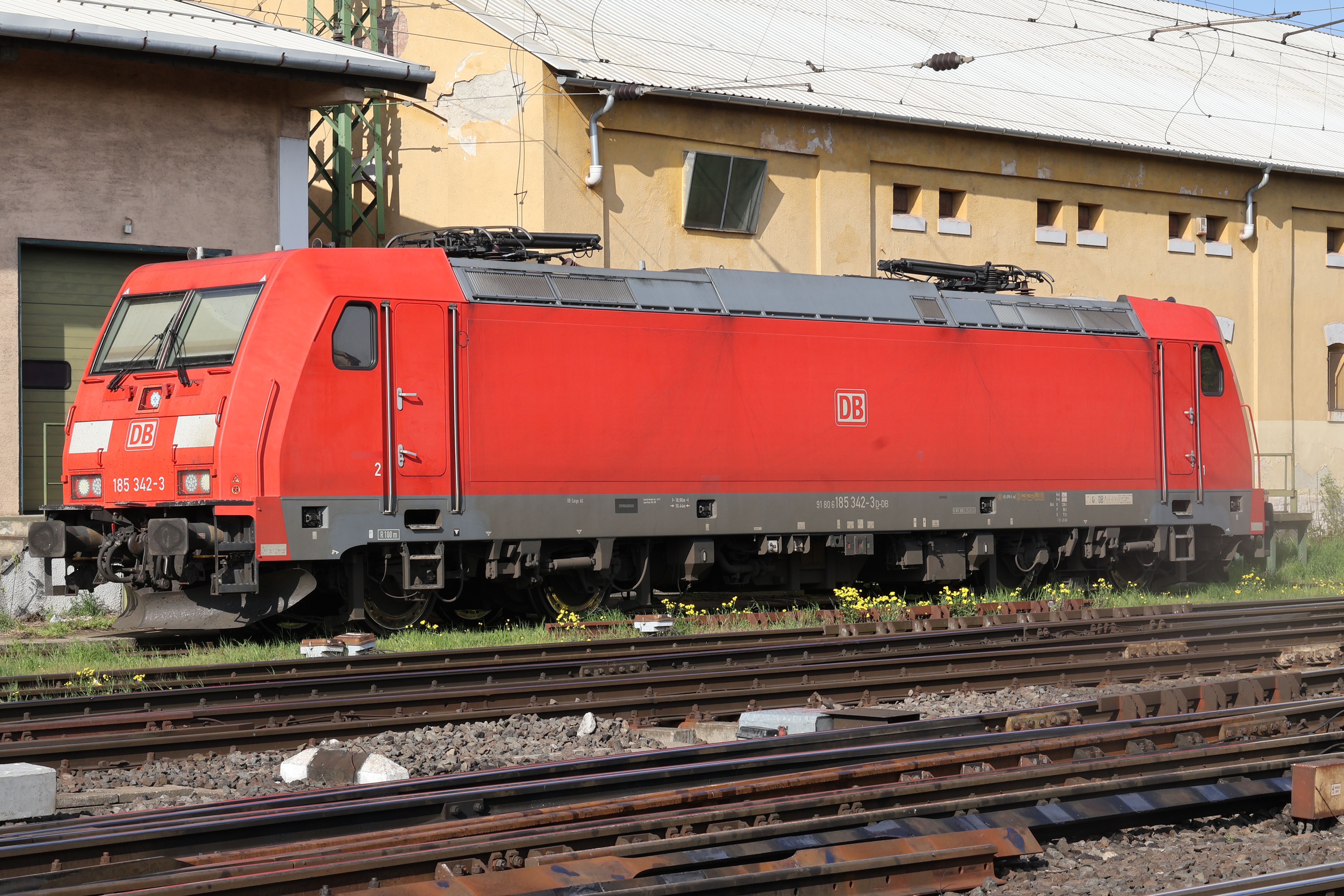 Red DB Train Locomotive on Railway Tracks · Free Stock Photo