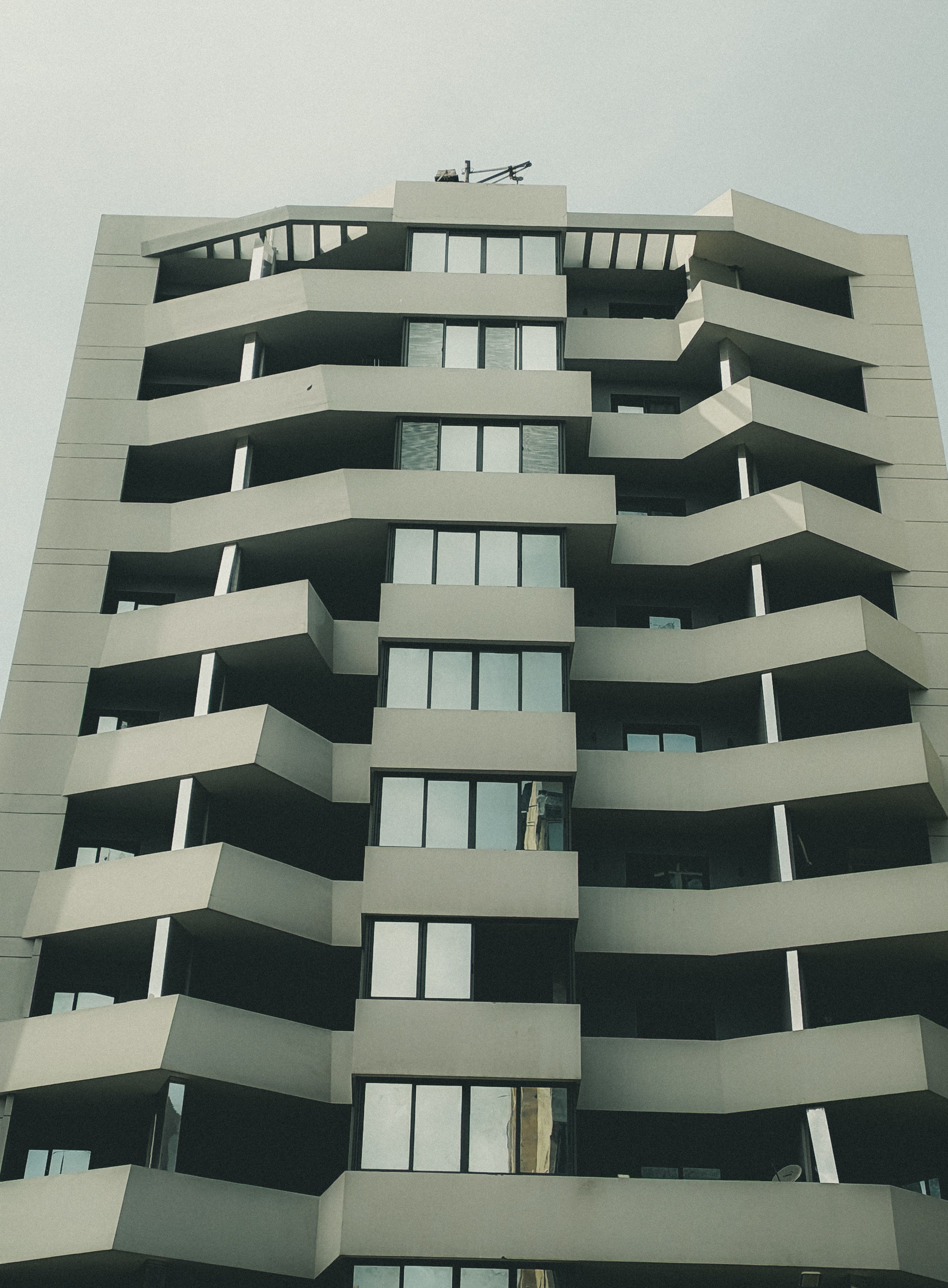 Modern Architectural High-Rise Building Facade · Free Stock Photo