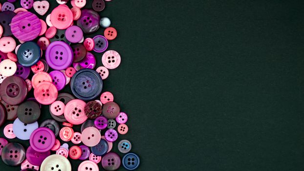A vibrant collection of colorful buttons with ample copy space on the right.