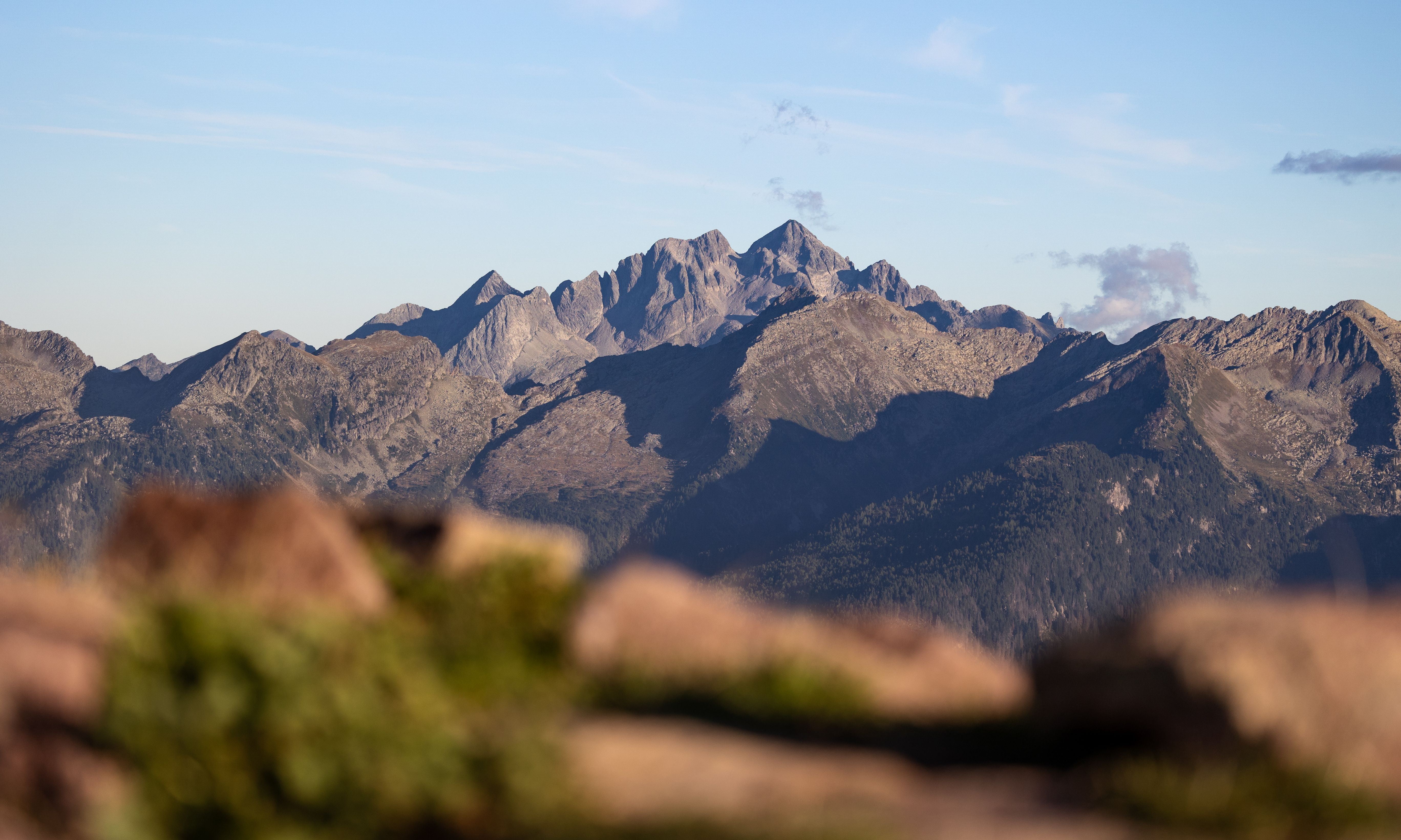 Majestic Mountain Range under a Clear Blue Sky · Free Stock Photo