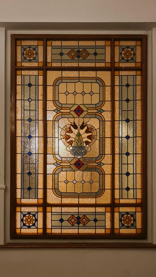 Free Intricate stained glass window with geometric and floral design in İstanbul. Stock Photo