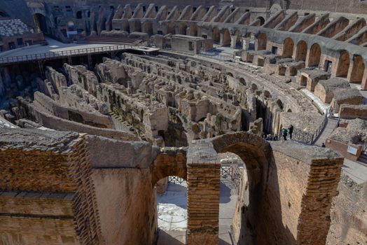 Explore the ancient ruins inside the iconic Colosseum in Rome, capturing Roman architecture's grandeur.