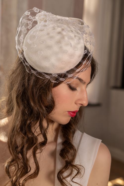 Elegant Portrait of a Woman in a Bridal Veil · Free Stock Photo
