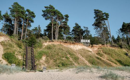 Free Explore the tranquil beauty of Jurkalne's coastal bluffs and lush pine forest in Latvia. Stock Photo