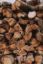 Wooden logs prepared for production of lumber