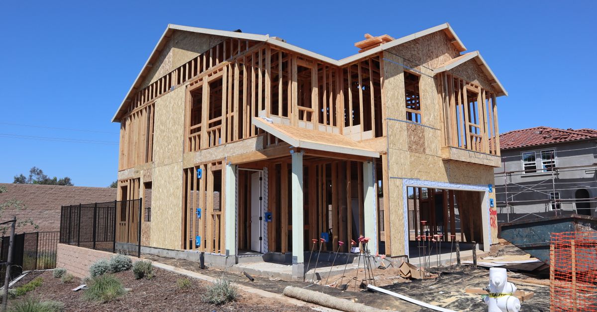 New suburban house in Elk Grove, California under construction, showing framing and development.