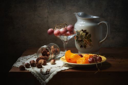 Table set with cut fruit — photo by Matvei on Pexels
