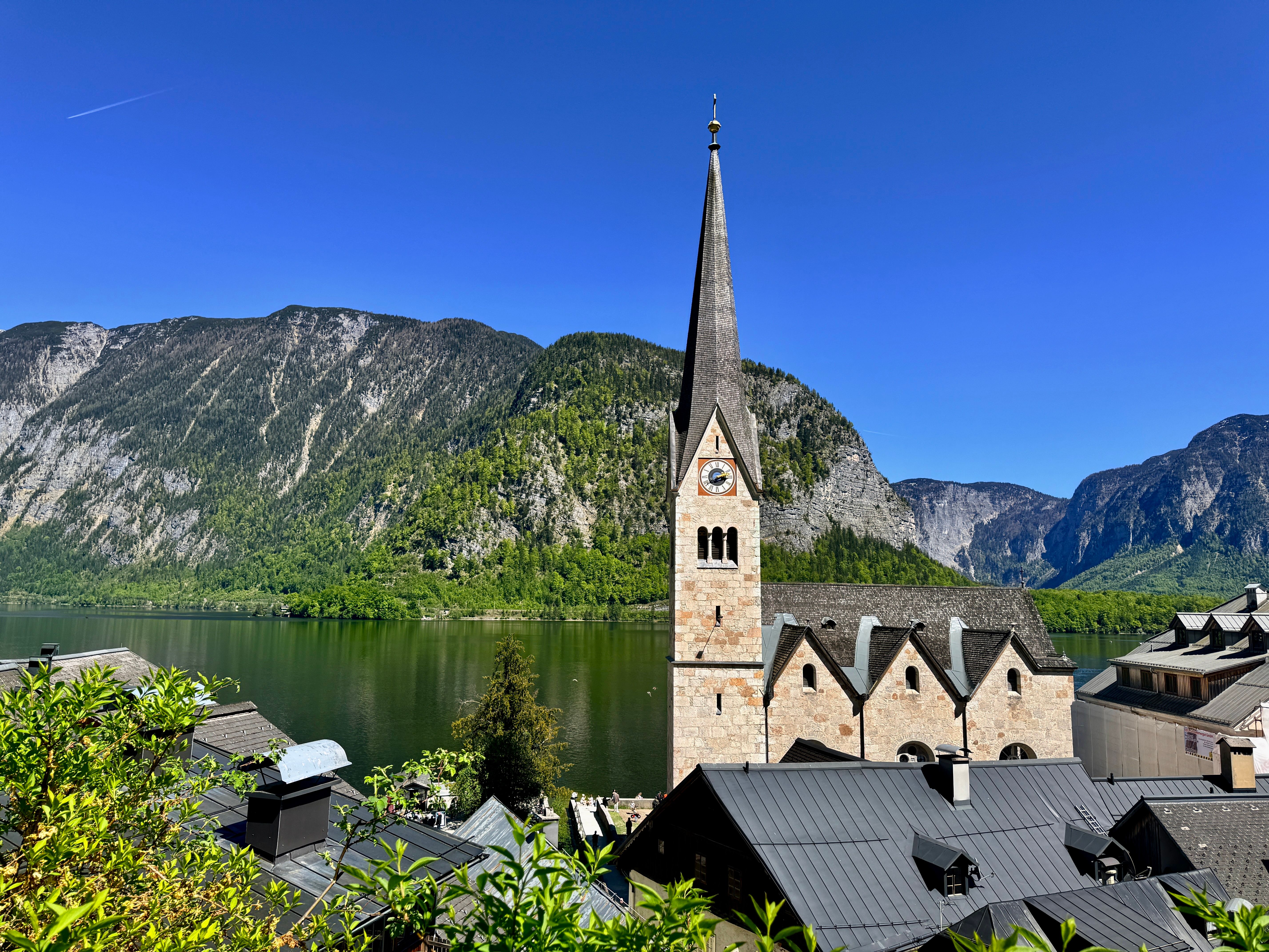 Picturesque Hallstatt with Lakeside Church and Mountains · Free Stock Photo