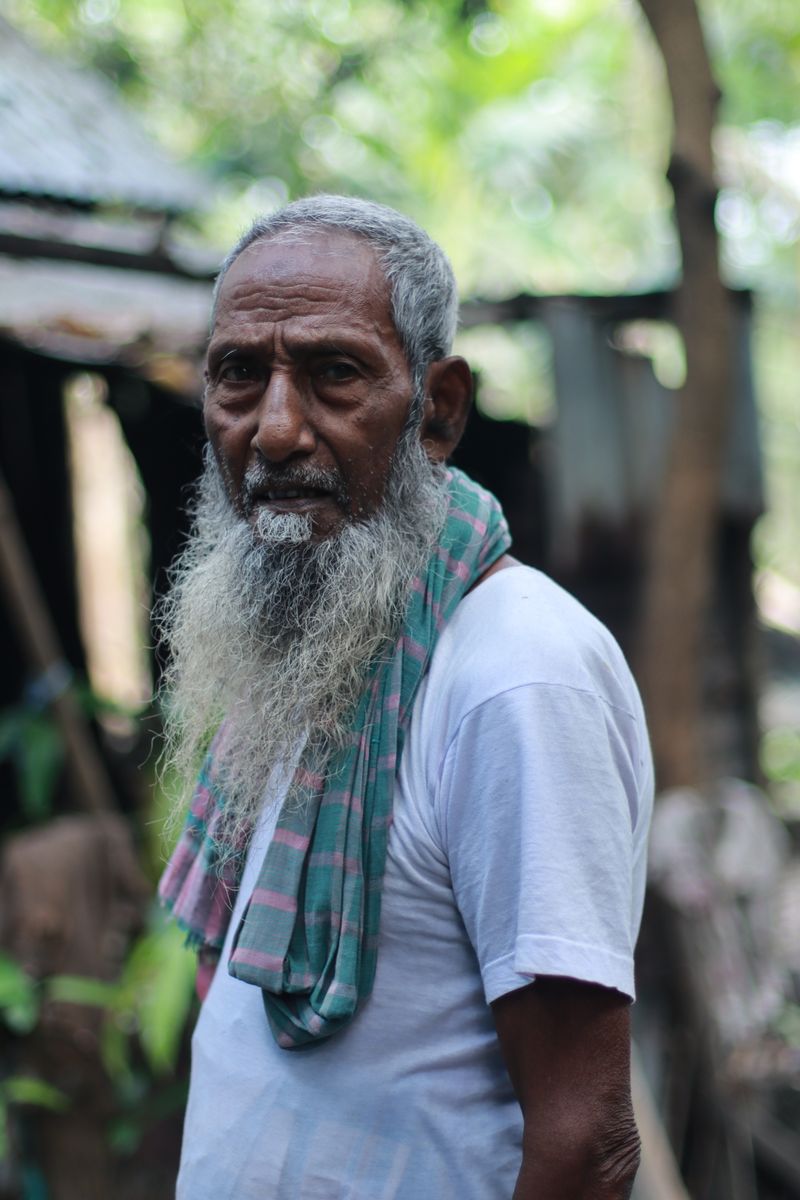 Portrait of an Elderly Man in Traditional Attire · Free Stock Photo