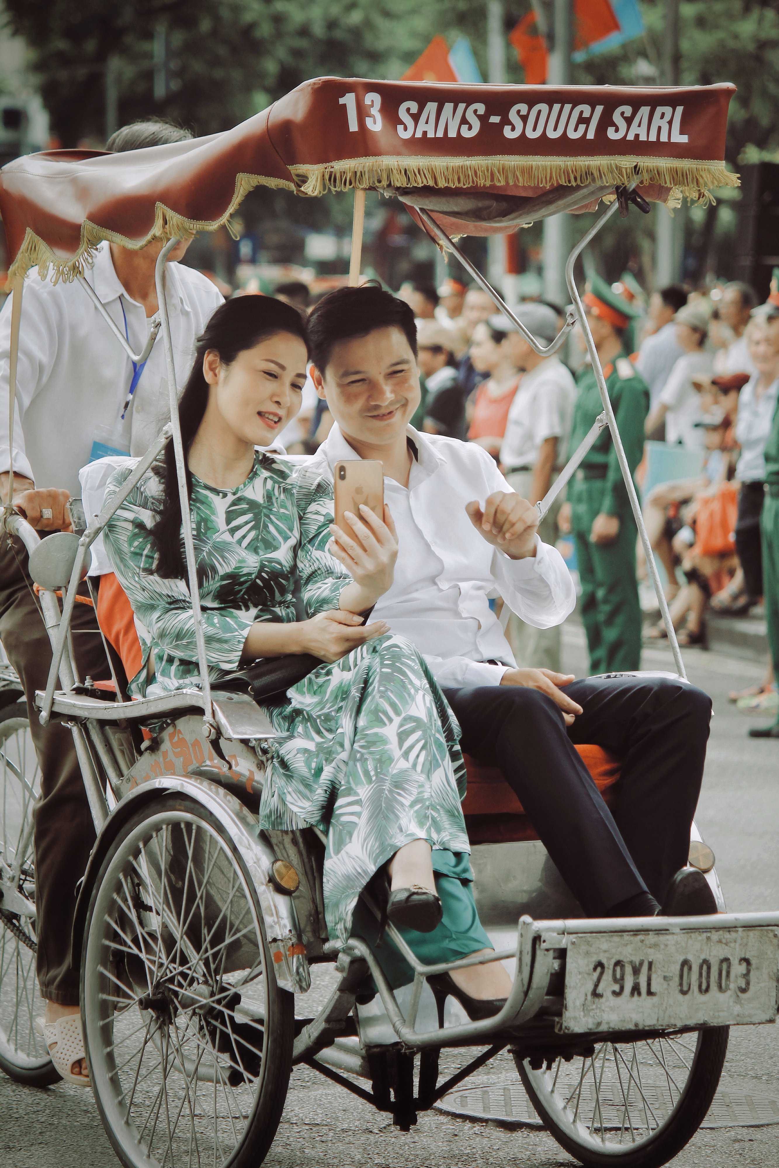 Couple Enjoying a Rickshaw Ride in an Urban Setting · Free Stock Photo