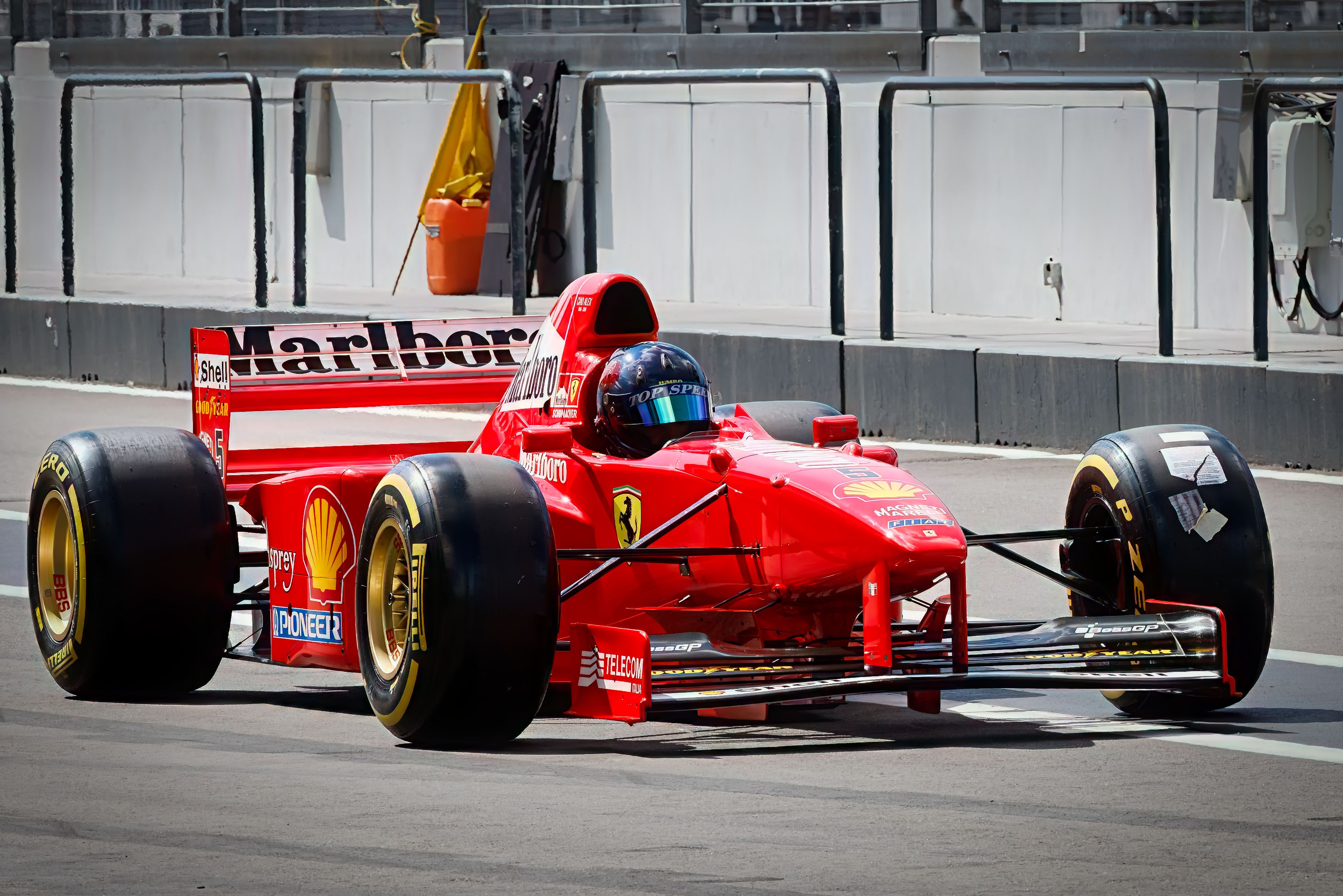 Red Formula 1 Race Car on Track · Free Stock Photo