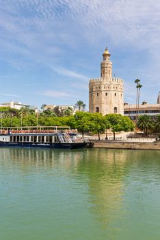 Scenic view of Torre del Oro by the Guadalquivir River in Seville, Spain.