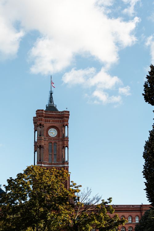 Free Scenic view of Berlin's Rotes Rathaus tower and clock on a clear day. Stock Photo