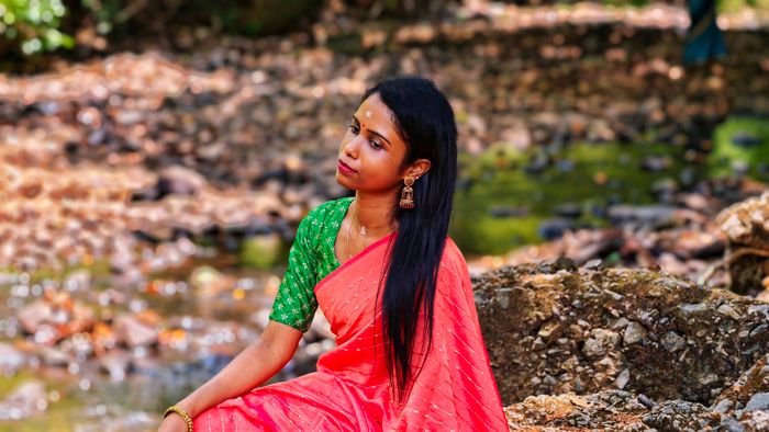 Woman in traditional dress outdoors in India