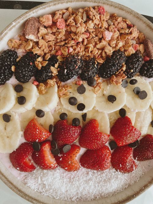 Free Delicious breakfast bowl with fresh fruits, granola, and chocolate chips. Stock Photo