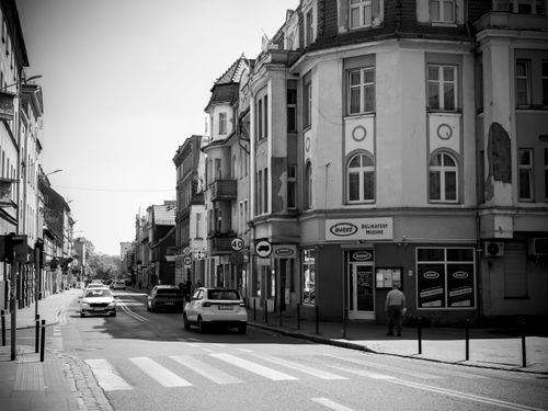 Free Monochrome scene of a typical street view in Wrocław, featuring historical architecture. Stock Photo