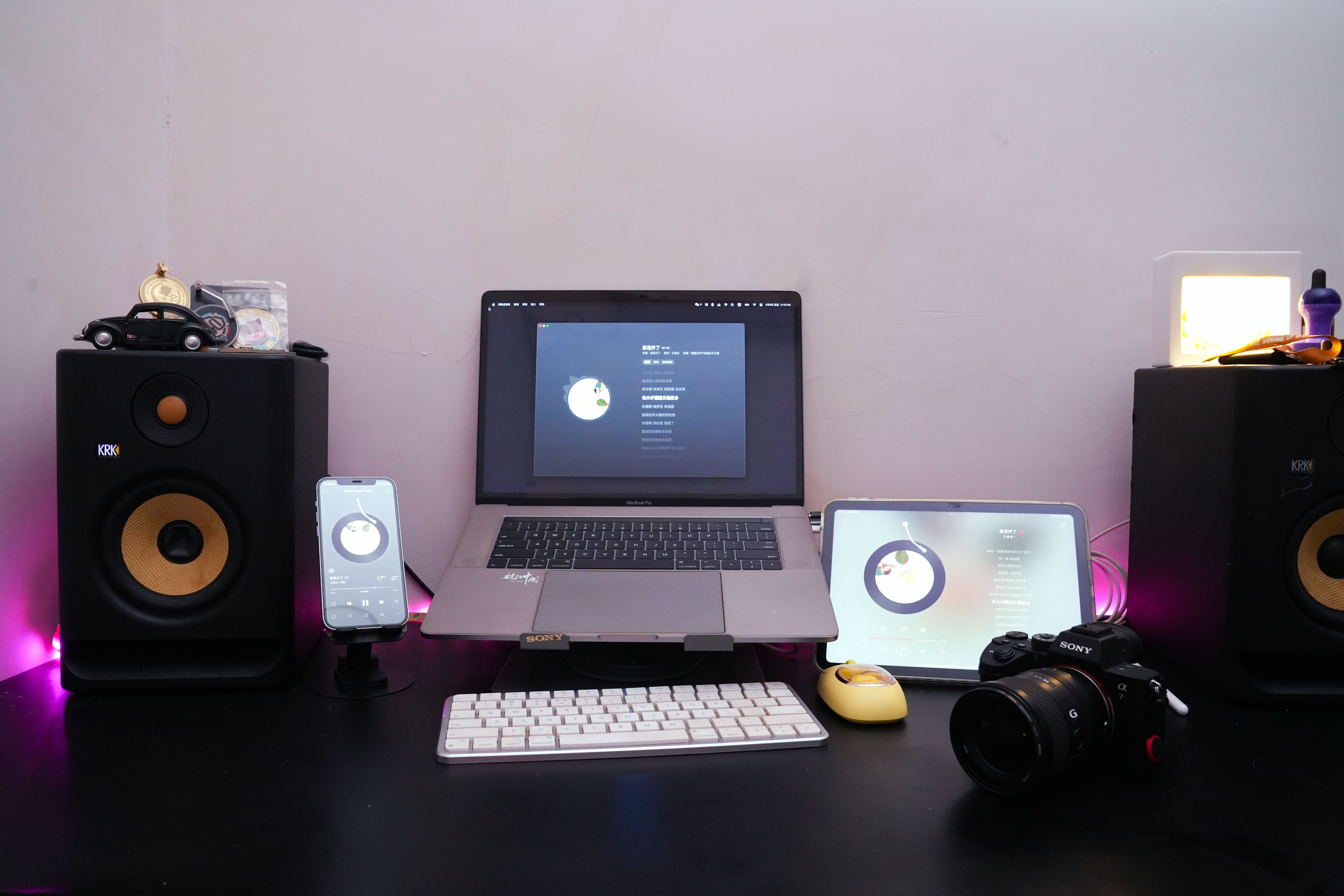 A workspace covered in research notes and a laptop