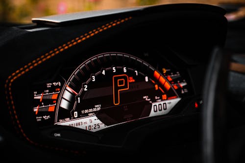 Speedometer On Dashboard Of A Car In Close Up View