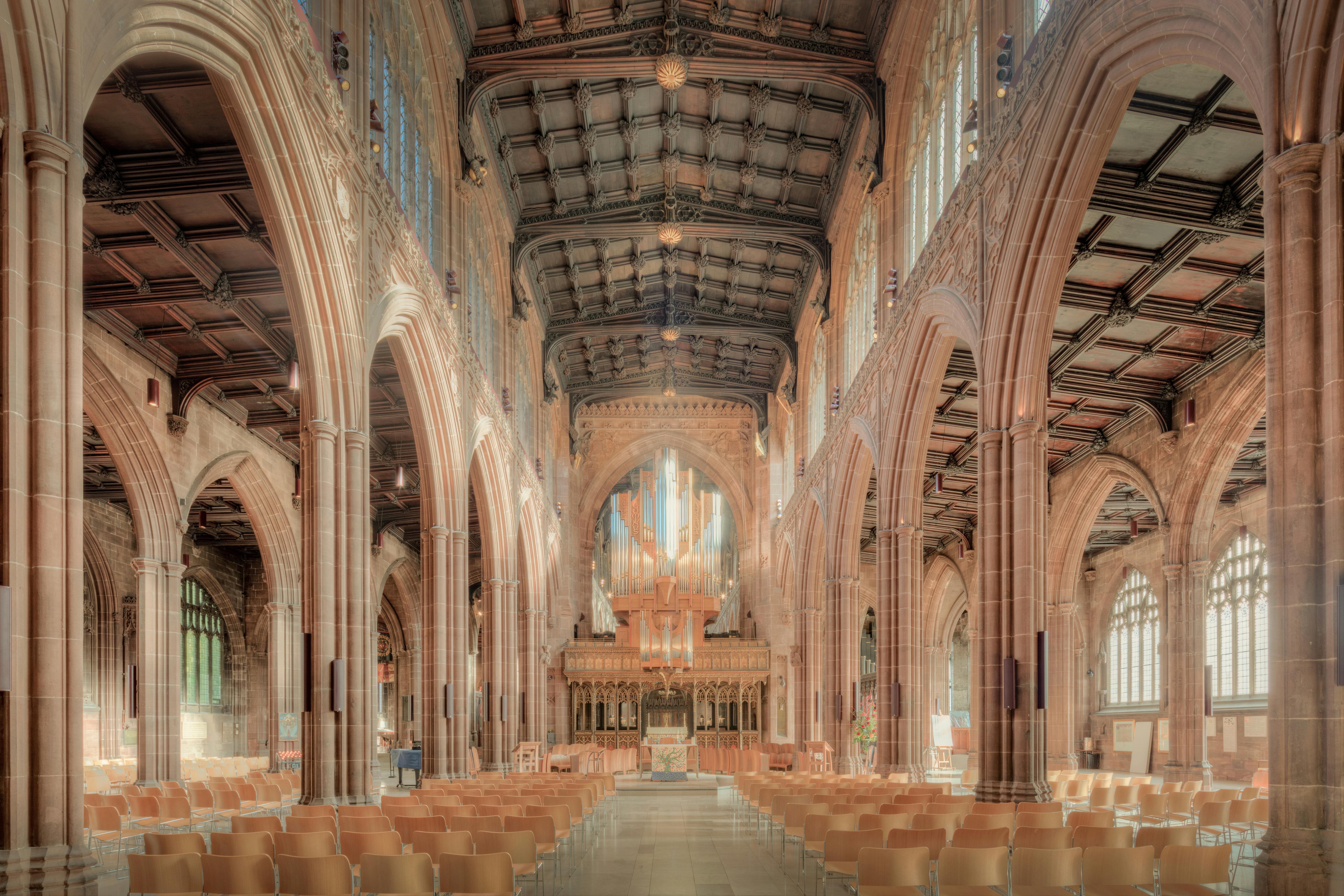 Explore the stunning Gothic architecture inside Manchester Cathedral.