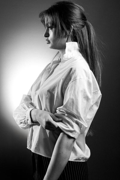 Monochrome studio portrait in profile by PIC MATTI on Pexels