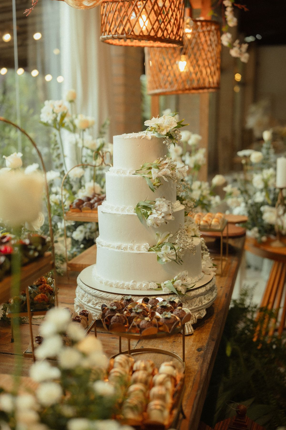 Elegant tiered wedding cake with floral decor