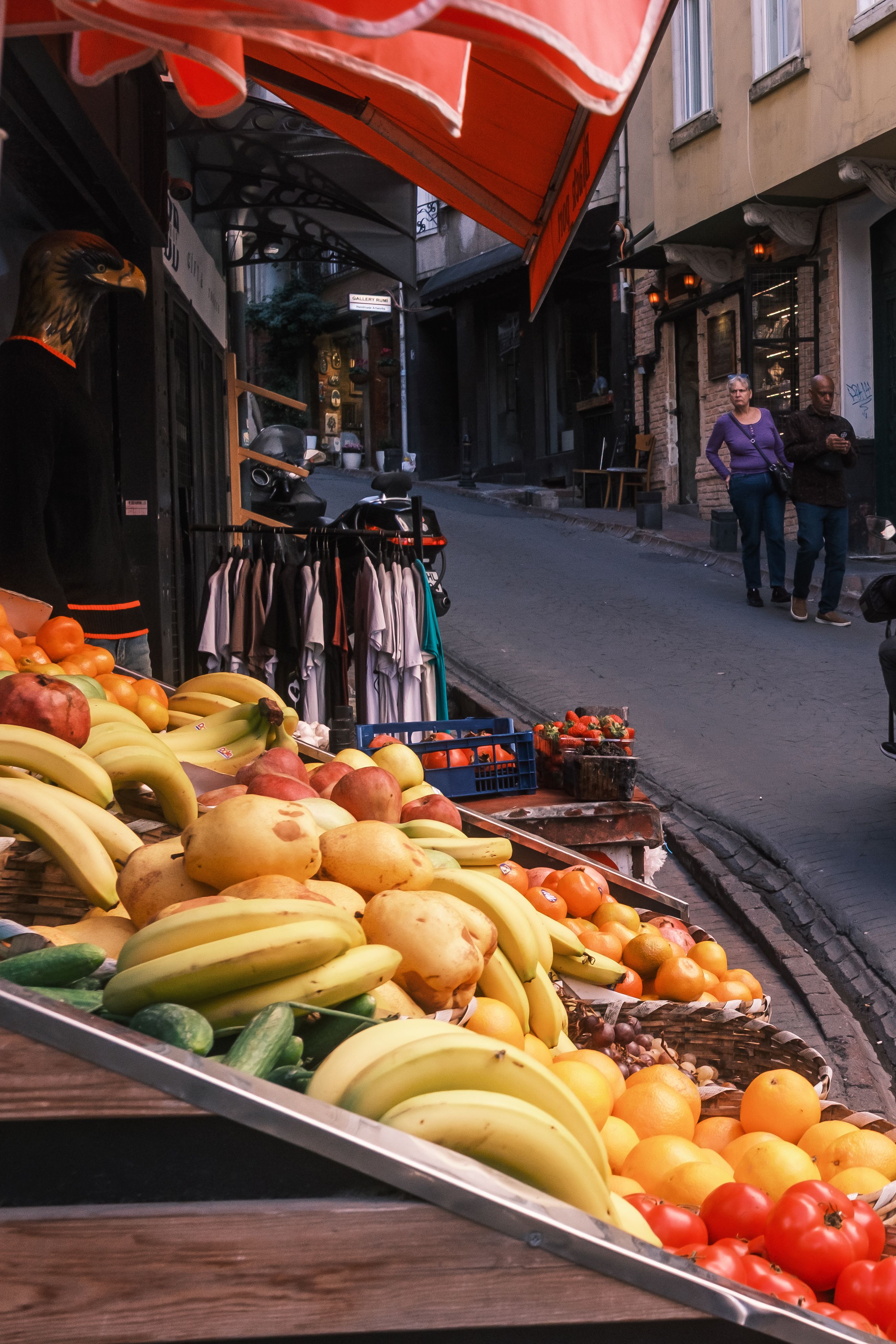 Vibrant Street Market with Fresh Fruits Displayed · Free Stock Photo