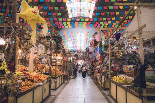 Free A colorful market in Guanajuato, Mexico bursting with fresh produce and traditional decorations. Stock Photo