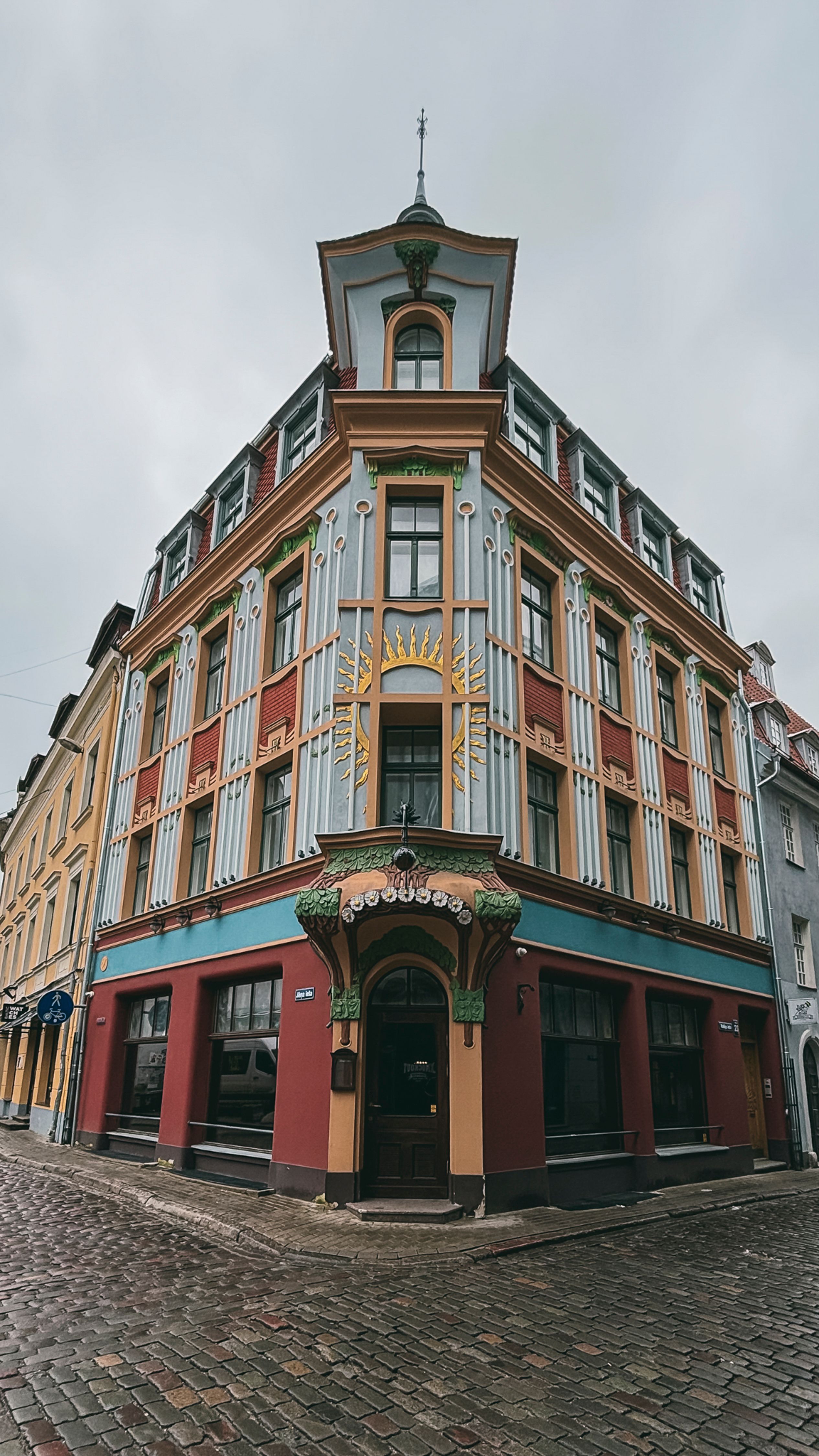 A colorful Art Nouveau building located in vibrant Riga, Latvia.