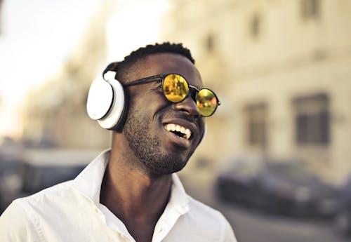 Free Photo Of Man Using Headphones Stock Photo