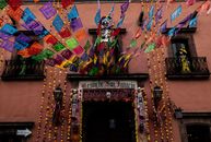 Colorful Day of the Dead decorations adorn a building in San Miguel de Allende, Mexico.