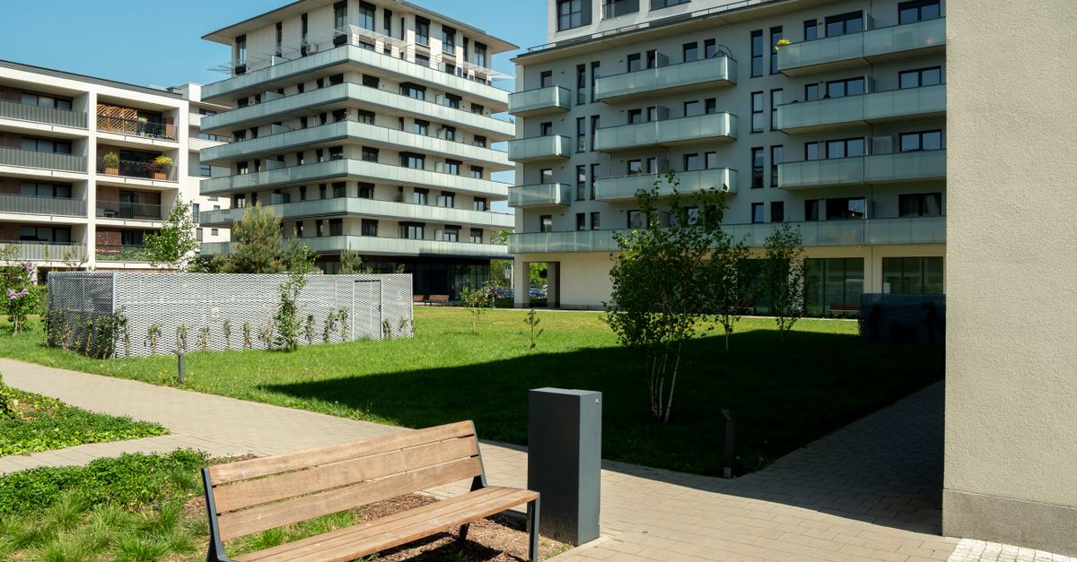 Contemporary apartment buildings with green spaces in Wrocław, Poland.