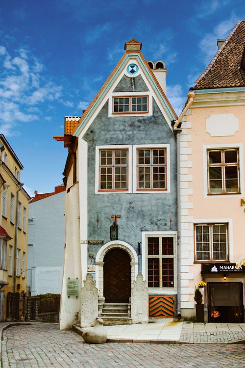 Free Colorful medieval architecture in Tallinn's old town featuring a quaint blue facade. Stock Photo