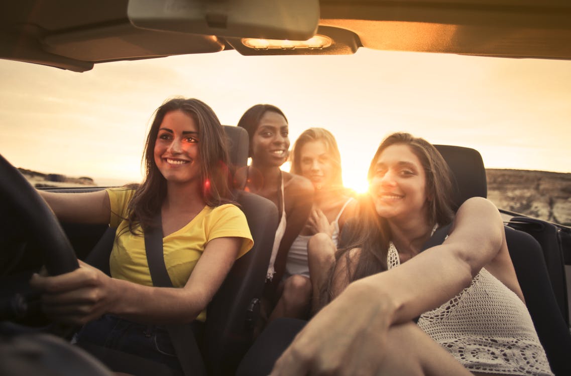 Free Photo Of Women Sitting On Car Stock Photo