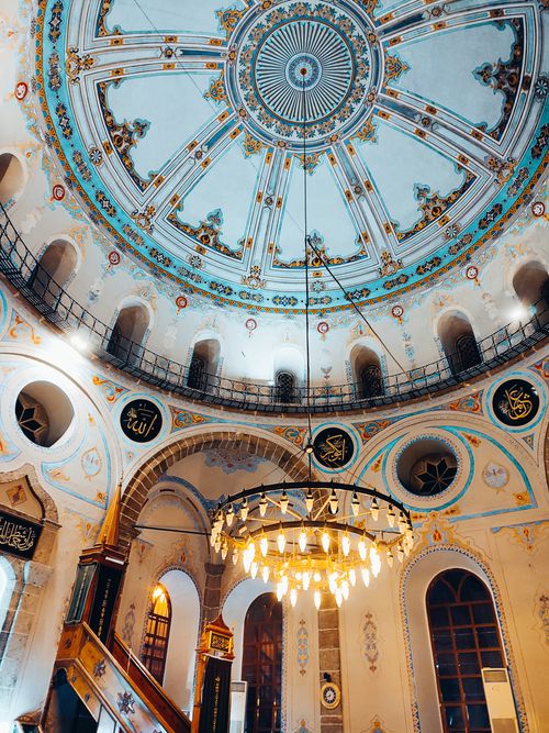 Free Captured inside a mesmerizing mosque in Samsun, Türkiye, showcasing intricate dome details and vibrant decor. Stock Photo